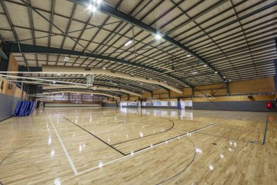 Wide shot of Mount Warren Sports and Fitness Centre indoor basketball courts